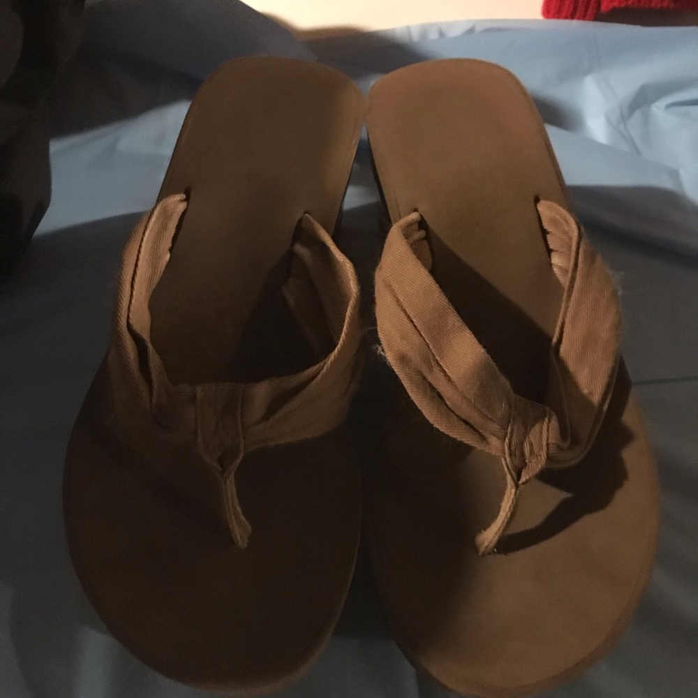 Brown flip flops